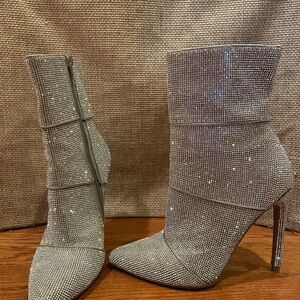 Steve Madden Silver Heeled Boots with Sleek Design size 6